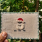 Hand-embroidered postcard featuring a festive Santa Claus design, crafted from sustainable linen, ideal for holiday greetings