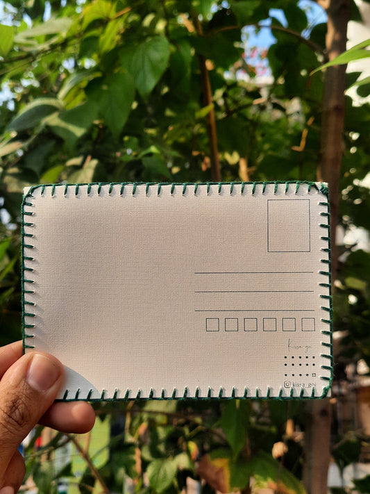 Back side of the hand-embroidered postcard showing the 225 gsm textured paper, ideal for writing with a ball pen