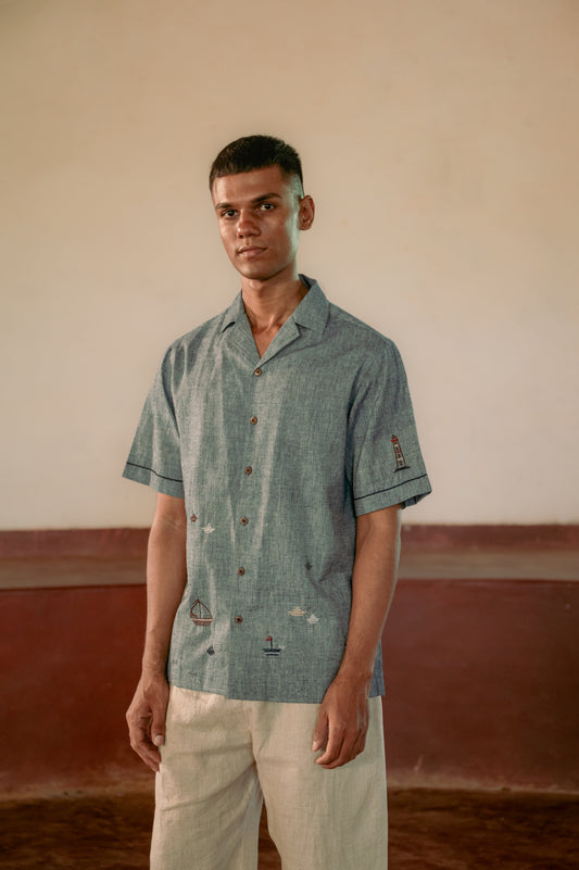 man in eco-friendly hand woven cotton shirt standing in a yoga hall. Half sleeve shirt, Material: cotton, Front view