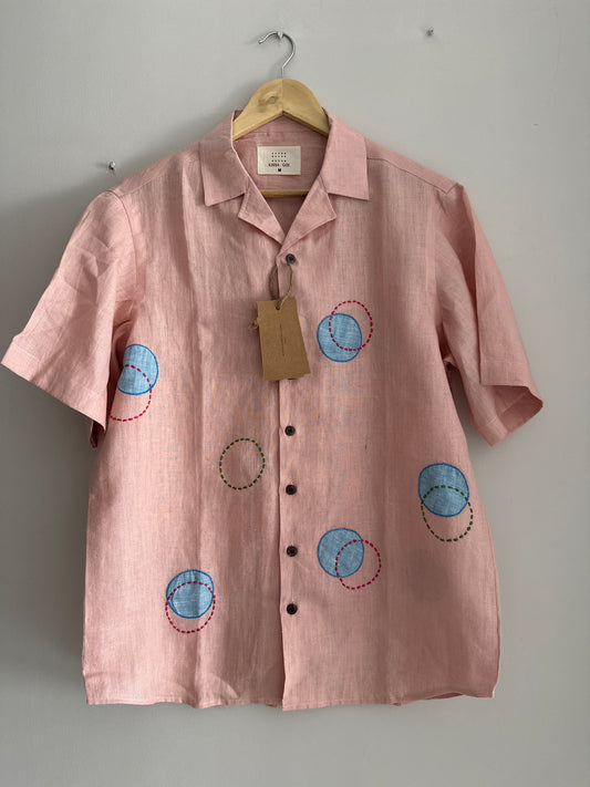 Circles and Disks on peach linen shirt