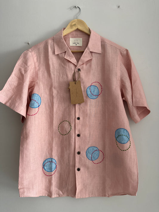 Circles and Disks on peach linen shirt