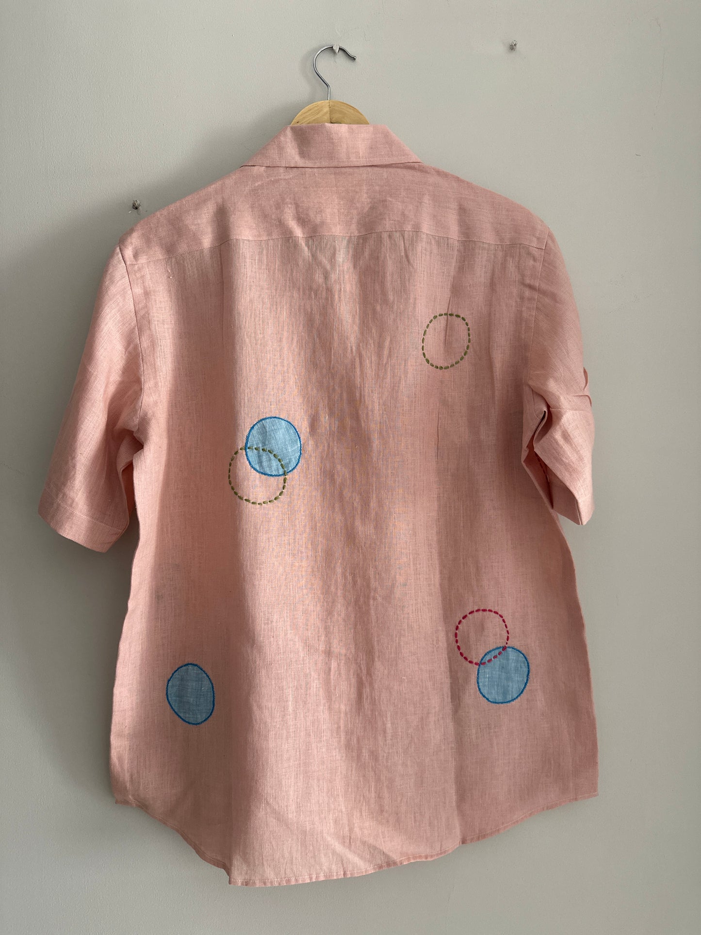 Circles and Disks on peach linen shirt