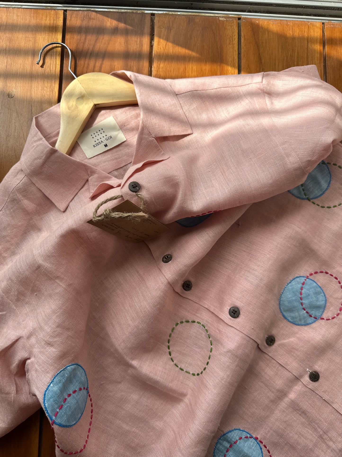 Circles and Disks on peach linen shirt