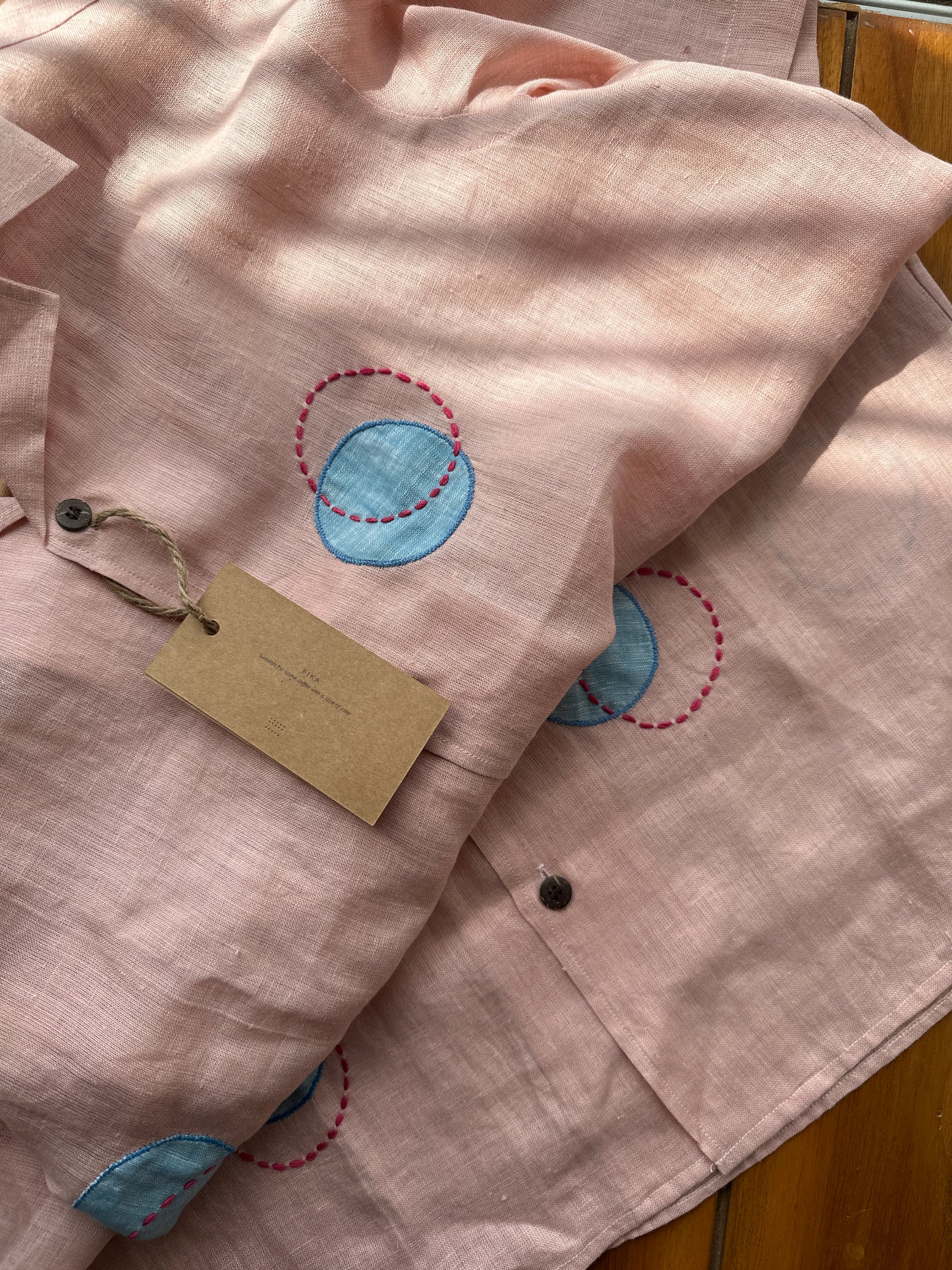 Circles and Disks on peach linen shirt