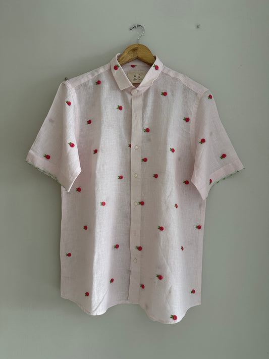 Buds in light pink linen shirt