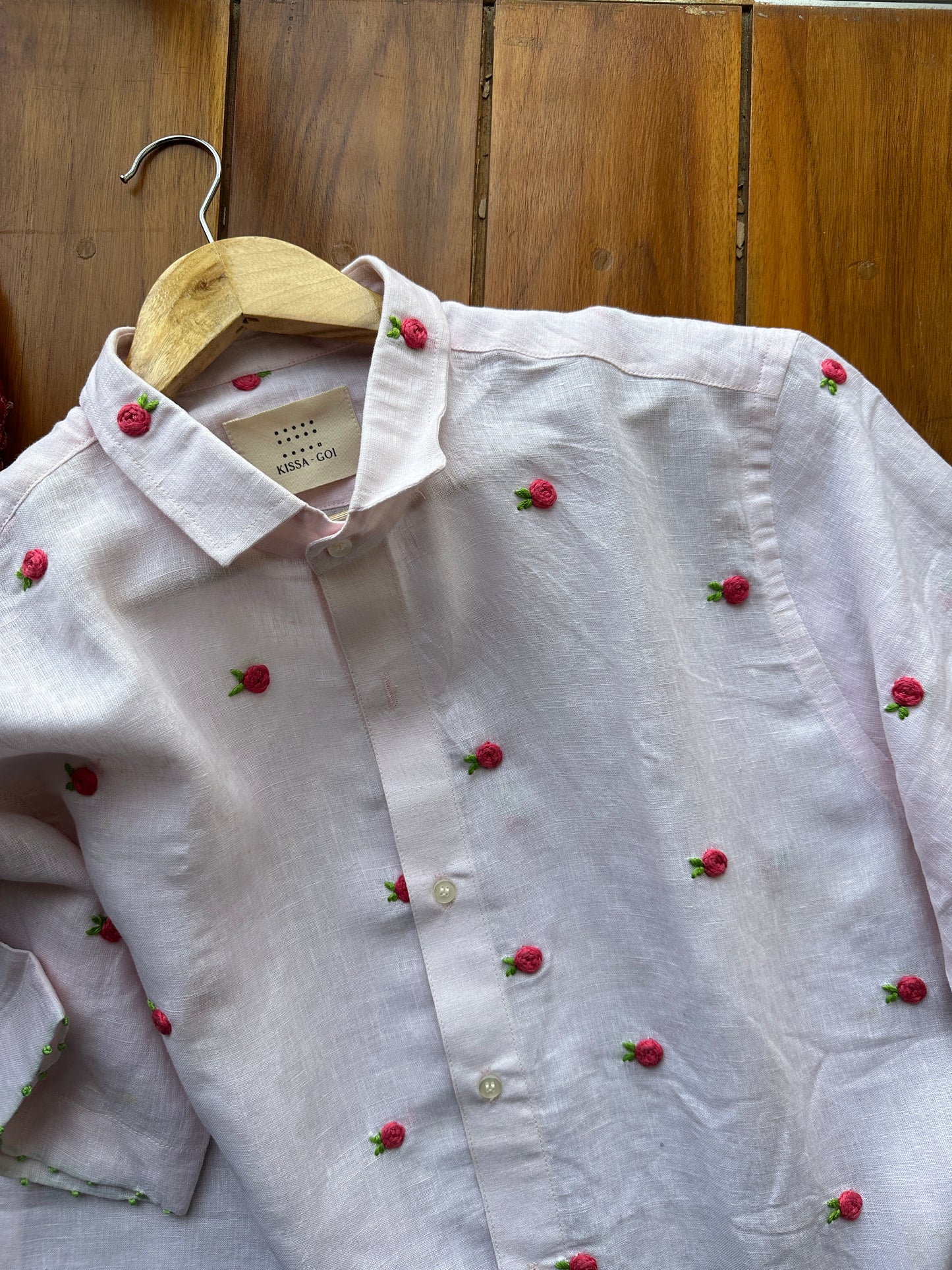 Buds in light pink linen shirt