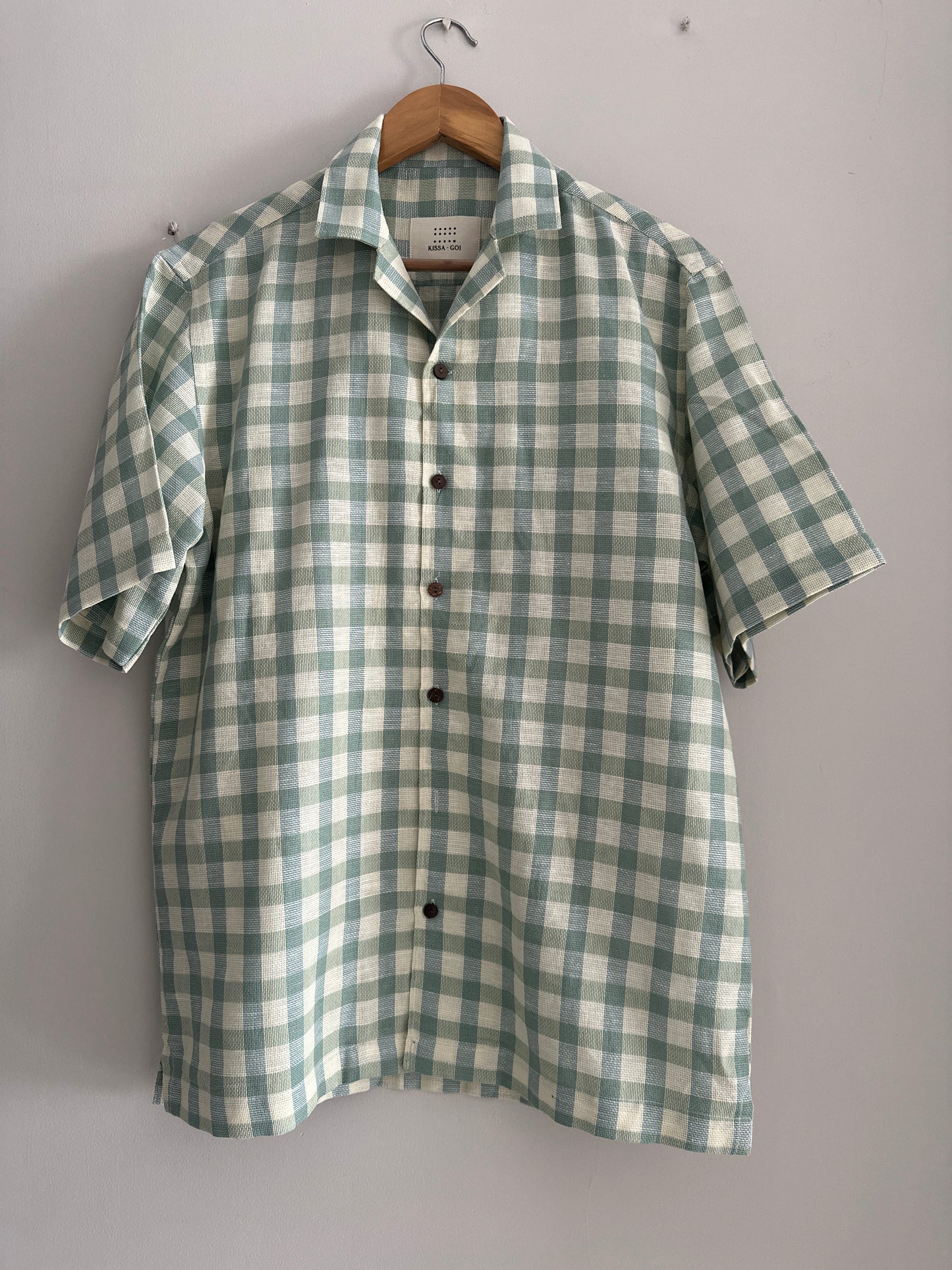 Green and white checkered shirt