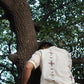 Back of an off-white kala cotton hand-embroidered shirt