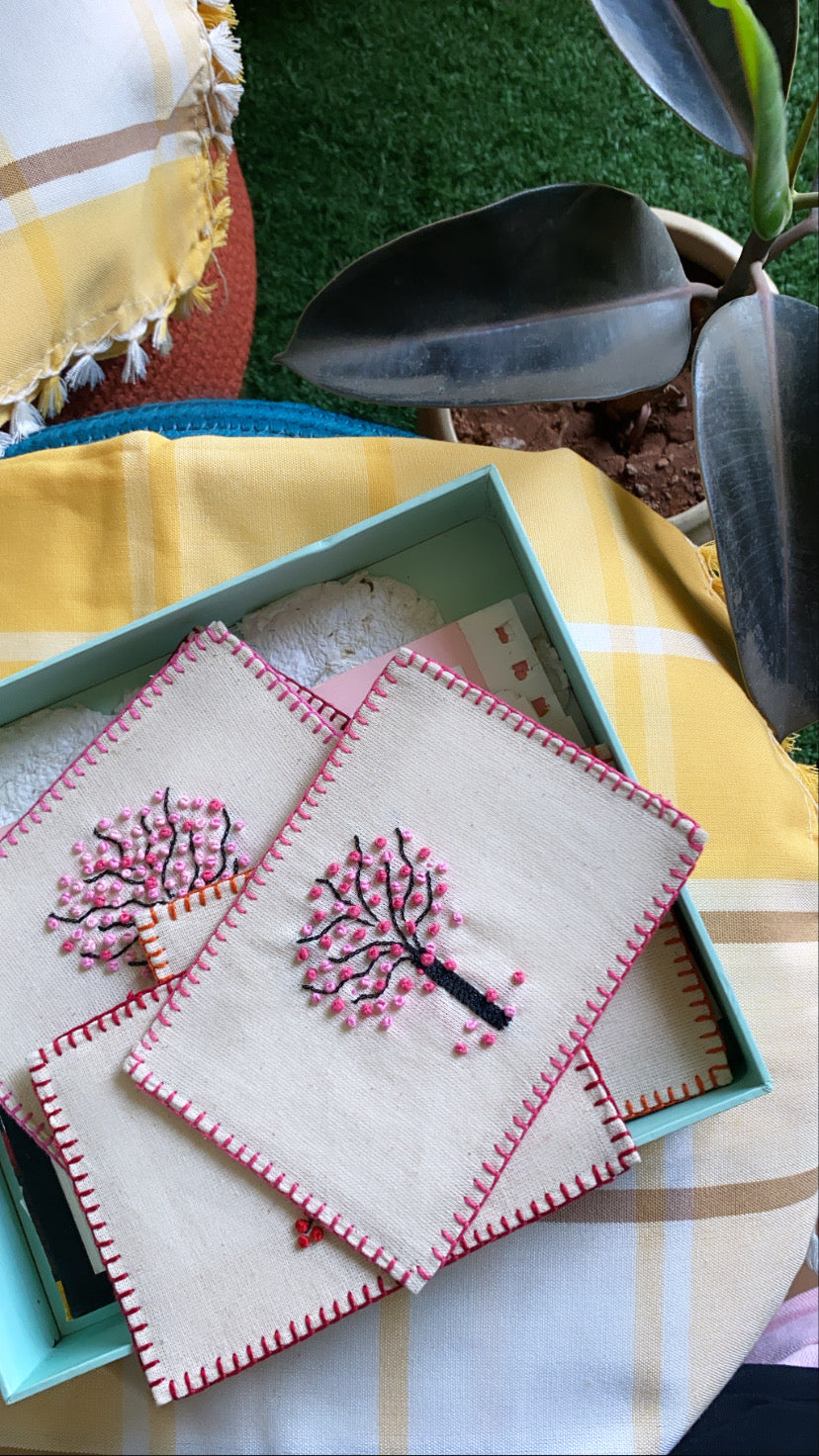 Hand-embroidered postcard depicting a cherry blossom branch, crafted from eco-friendly linen, ideal for spring greetings