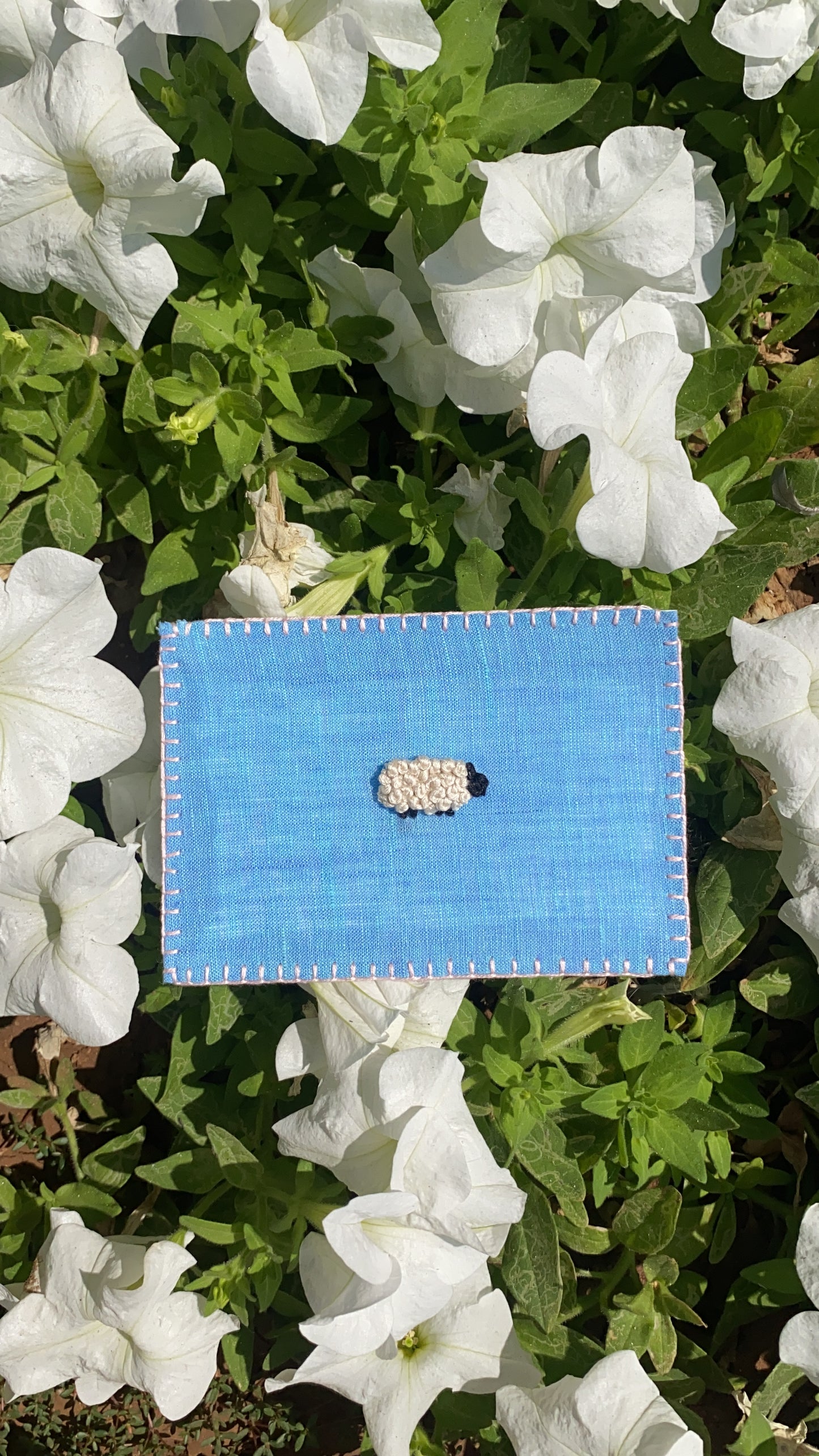 Hand-embroidered Blue Sheep postcard on eco-friendly linen, perfect for unique gifts and personal notes.